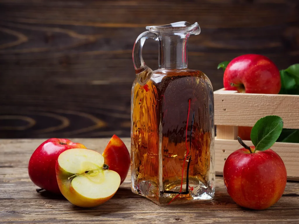 Apple Cider Vinegar Jar 11 Foods to Help Hair Growth & Why They Work (w/ Recipes)