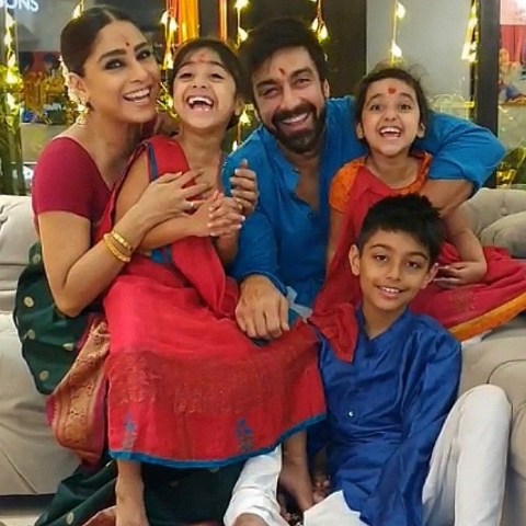 Ashish Chowdhry with his wife and children